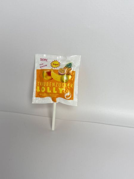 Льодяник на паличці з Декстрозою Frigeo Traubenzucker Lolly Tropic із тропічним смаком, 9 г 2296779451 фото